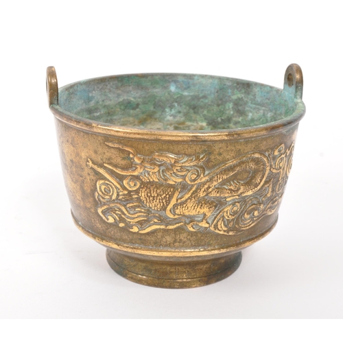 263 - A 19th Century brass censer / scent bowl of circular form with dragon relief design to body. (6.5cm ... 