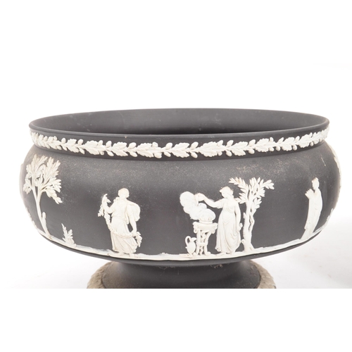 27 - Wedgwood - A pair of 20th Century ceramic Wedgwood black basalt Jasperware pedestal bowls featuring ... 