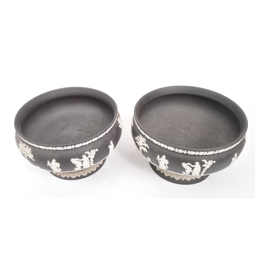 27 - Wedgwood - A pair of 20th Century ceramic Wedgwood black basalt Jasperware pedestal bowls featuring ... 