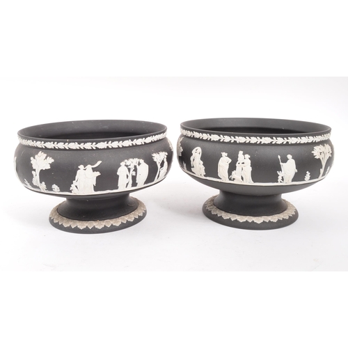 27 - Wedgwood - A pair of 20th Century ceramic Wedgwood black basalt Jasperware pedestal bowls featuring ... 