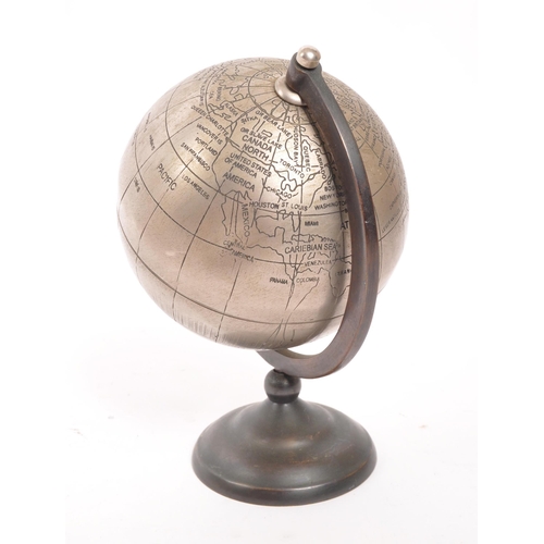 277 - A small 20th Century circa 1960s / 70s metallic world desktop globe with copper frame and base.(17cm... 