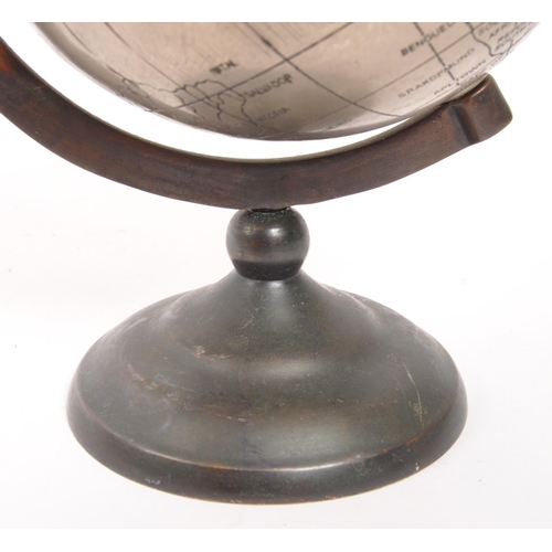 277 - A small 20th Century circa 1960s / 70s metallic world desktop globe with copper frame and base.(17cm... 