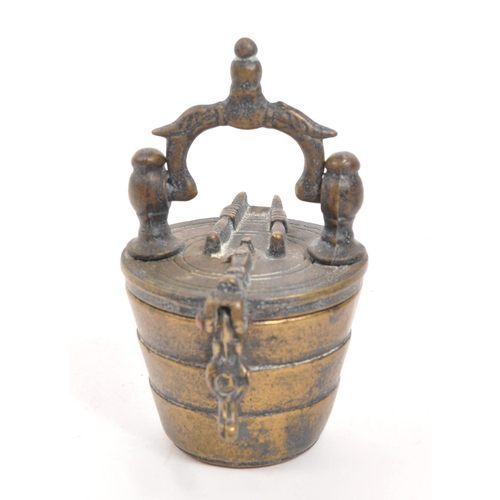 278 - An 18th Century Nuremberg bronze apothecary scale weight set. With three ' cups ' within of graduati... 