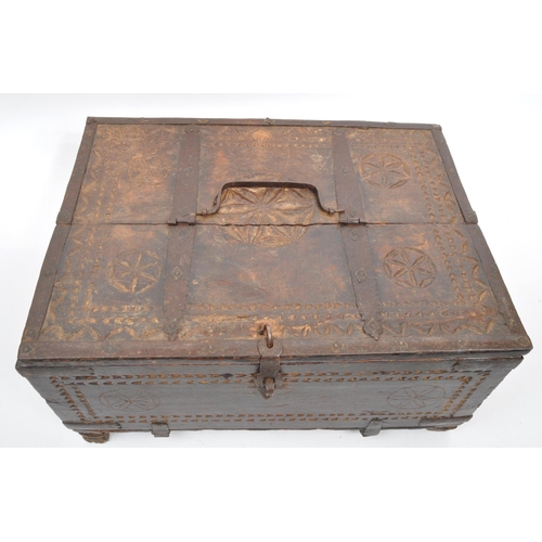 279 - A 17th Century Indian hand carved sandalwood dowry box / chest with folding lid and long iron hinges... 