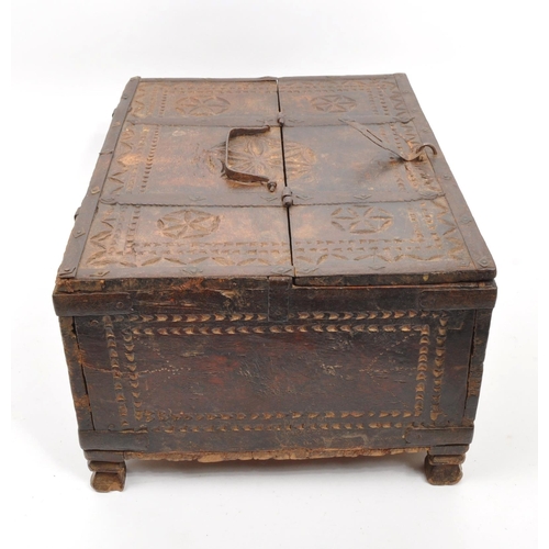 279 - A 17th Century Indian hand carved sandalwood dowry box / chest with folding lid and long iron hinges... 