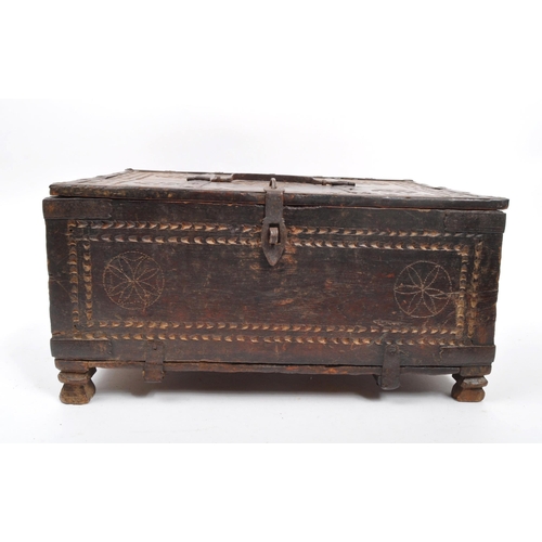 279 - A 17th Century Indian hand carved sandalwood dowry box / chest with folding lid and long iron hinges... 