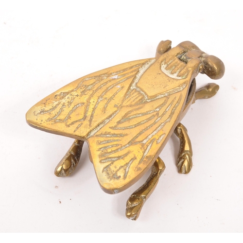 284 - A collection of vintage 20th century brass frogs and trinket box fly. Frog ornament crossed legged i... 