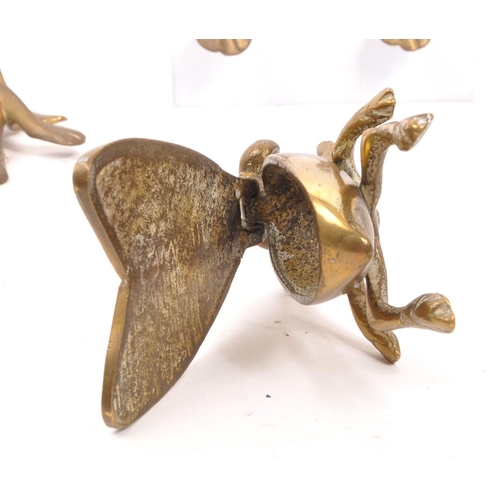 284 - A collection of vintage 20th century brass frogs and trinket box fly. Frog ornament crossed legged i... 