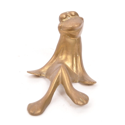 284 - A collection of vintage 20th century brass frogs and trinket box fly. Frog ornament crossed legged i... 