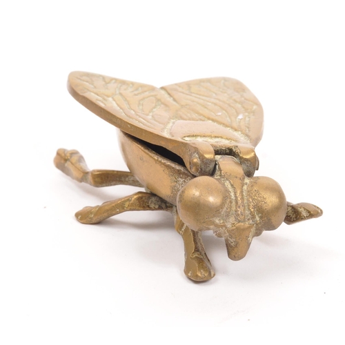 284 - A collection of vintage 20th century brass frogs and trinket box fly. Frog ornament crossed legged i... 