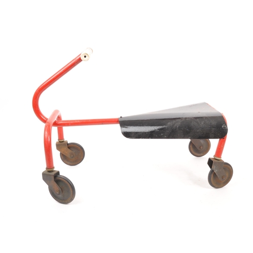 287 - A vintage 20th century small Triang style child's kart. With a red tubular frame, bent metal seat an... 