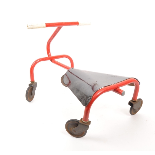 287 - A vintage 20th century small Triang style child's kart. With a red tubular frame, bent metal seat an... 