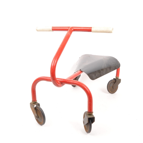 287 - A vintage 20th century small Triang style child's kart. With a red tubular frame, bent metal seat an... 