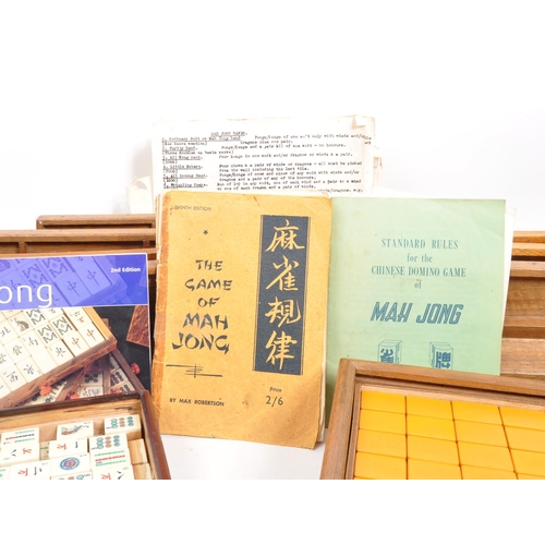 295 - Two 20th Century mahjong game sets each held within wooden boxes. Together with seven vintage wooden... 