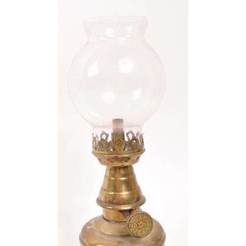 304 - A 20th Century French brass pigeon lamp / oil lamp with inscription to front: LAMPE FEUTREE 'OLYMPE'... 