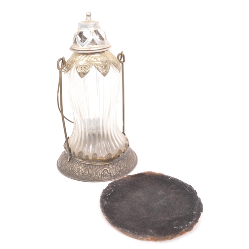 305 - A 20th Century glass and metal French porch lantern with a collection of other pewter items comprisi... 