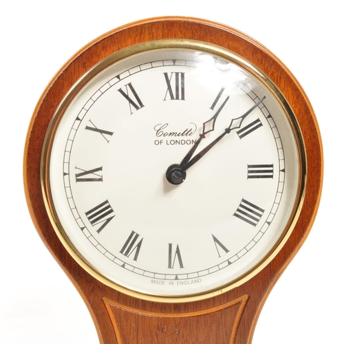 307 - Comitti of London - A 20th century Edwardian manner Comitti of London balloon mantle clock. The cloc... 