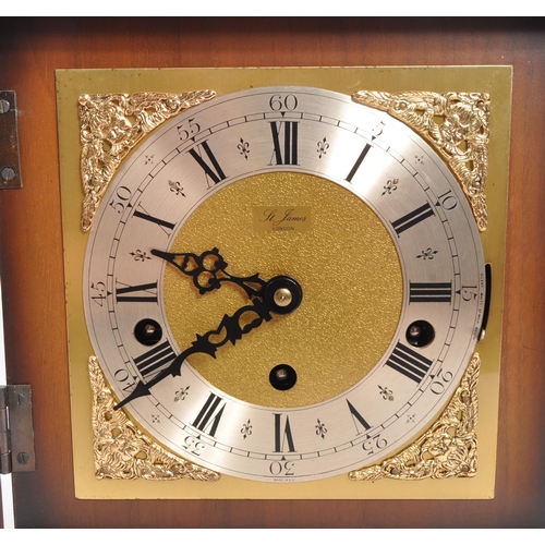 315 - St James - A vintage 20th century mantel clock. Gilt face with ebonised Roman numeral chapter ring. ... 