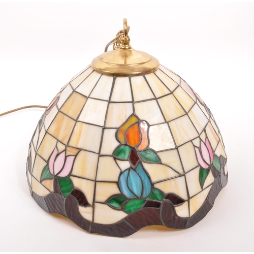 318 - Tiffany Manner - A vintage 20th century hanging ceiling light shade. Circular tapering form with col... 