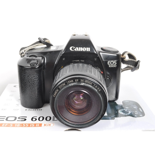 319 - Canon EOS 1000 - Olympus Trip 35 - Two vintage 20th century cameras. Together with a Cobra optics mo... 