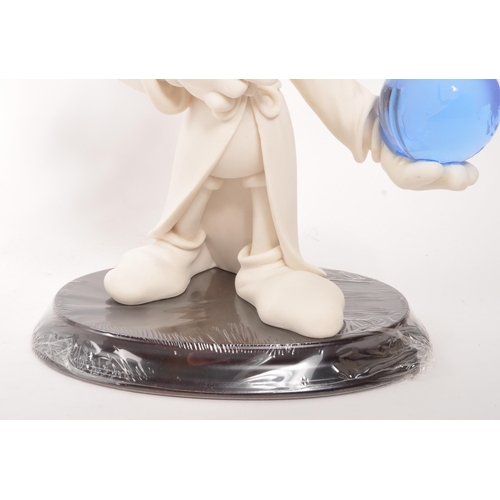 320 - Disney - A. Giannelli sculpture of Disney's Mickey Mouse Fantasia holding a glass globe. With paperw... 