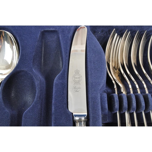 323 - Sheffield Cutlery - A 20th Century collection of stainless steel eight person Sheffield Cutlery cant... 