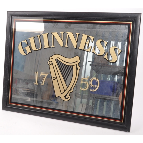 327 - Guinness - A late 20th century pub advertising point of sale sign / mirror. With the iconic harp and... 