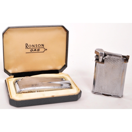 332 - Ronson / Mosda - Two mid 20th century British lighters. The collection to include a Ronson Typhoon V... 