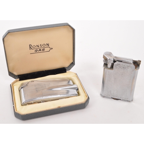 332 - Ronson / Mosda - Two mid 20th century British lighters. The collection to include a Ronson Typhoon V... 