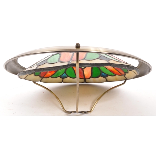 333 - A vintage Tiffany style brass and leaded stained glass ceiling light shade. White ground with red an... 