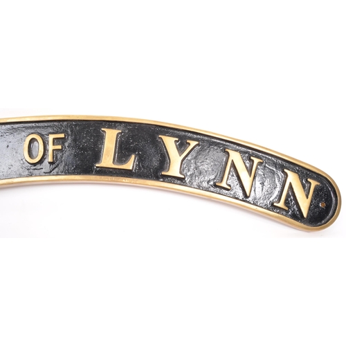 335 - A replica locomotive nameplate. Lady of Lynn. Ebonised background with gilt lettering and border. Ca... 