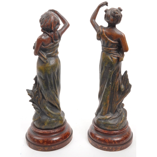 337 - After Charles Ruchot - Les Iris - A pair of 20th century French Art Nouveau cold painted spelter Iri... 