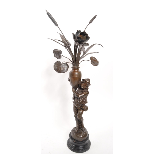 338 - A pair of early 20th century French Jardinere country metal sculptures / converted lamps. Each being... 