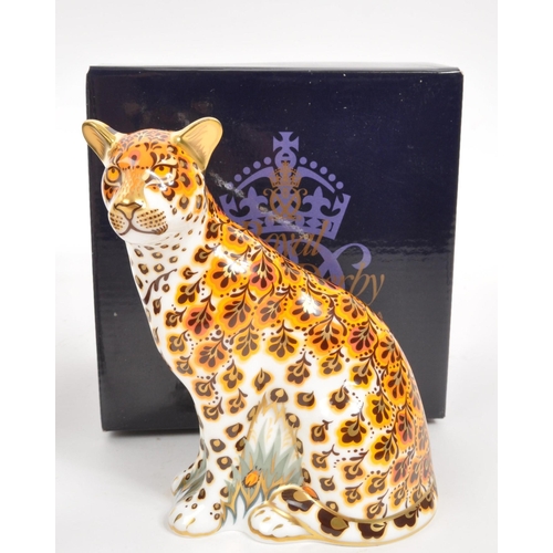 34 - Royal Crown Derby - Two porcelain china Royal Crown Derby ' Leopardess ' and ' Leopard Cub ' paperwe... 