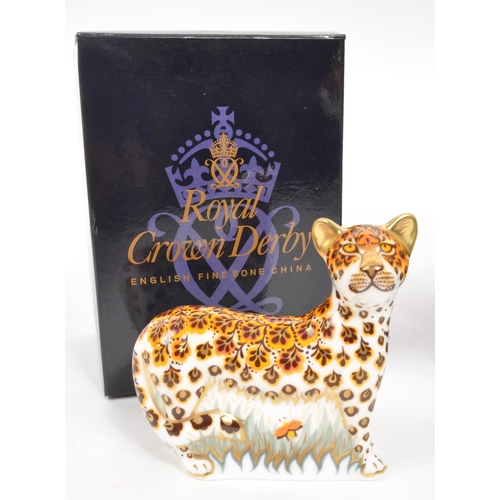 34 - Royal Crown Derby - Two porcelain china Royal Crown Derby ' Leopardess ' and ' Leopard Cub ' paperwe... 