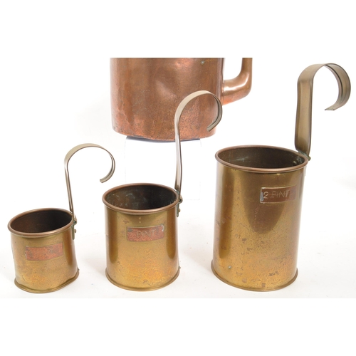 345 - Collection of vintage 20th century copper items. Including copper water kettles, two jug examples wi... 