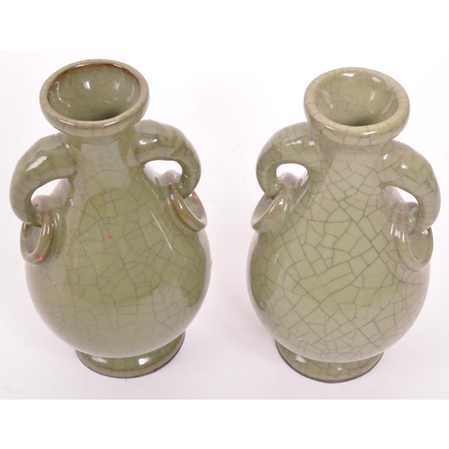 349 - Two vintage Chinese crackle glaze baluster vases. Oliver green with elephant head and ring handles. ... 