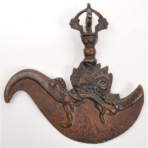 355 - A 19th century Tibetan bronze Kartika Vajra chopper having cast metal ornate details to handle. Meas... 