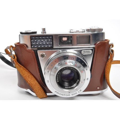 365 - Olympus - A mid 20th century circa 1970s Olympus OM-1 35mm SLR camera. The camera having silver body... 