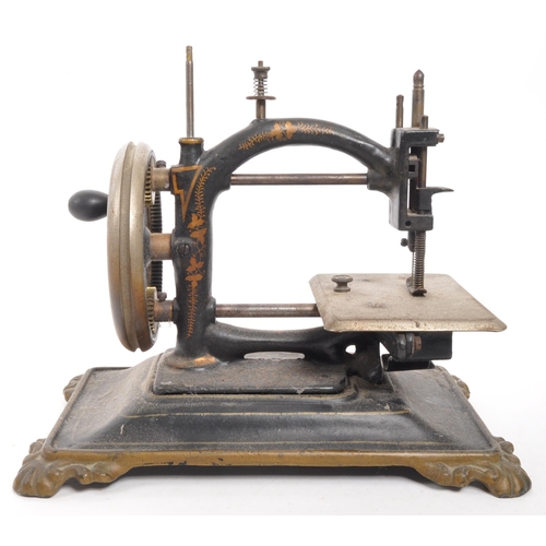 366 - A 19th Century ' Original Express ' miniature sewing machine by Guhl & Harbeck of Germany. Chain... 