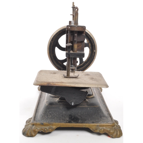 366 - A 19th Century ' Original Express ' miniature sewing machine by Guhl & Harbeck of Germany. Chain... 