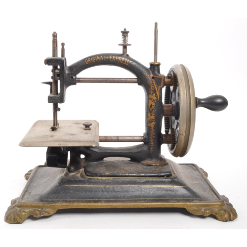 366 - A 19th Century ' Original Express ' miniature sewing machine by Guhl & Harbeck of Germany. Chain... 