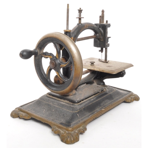 366 - A 19th Century ' Original Express ' miniature sewing machine by Guhl & Harbeck of Germany. Chain... 