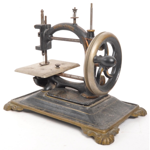 366 - A 19th Century ' Original Express ' miniature sewing machine by Guhl & Harbeck of Germany. Chain... 