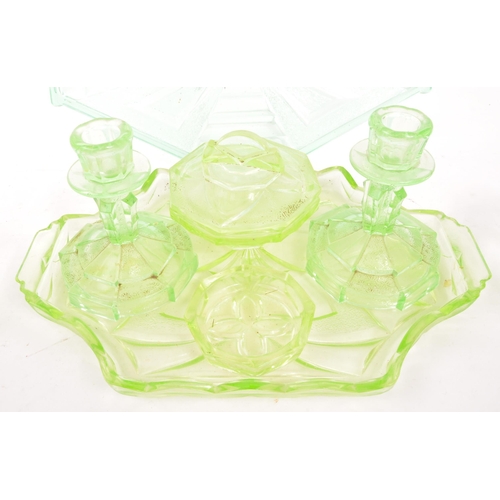 37 - A collection of 20th Century Art Deco style green glass dressing table / vanity sets. Comprising of ... 