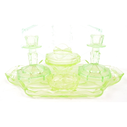 37 - A collection of 20th Century Art Deco style green glass dressing table / vanity sets. Comprising of ... 