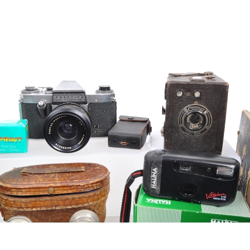 370 - A large collection of vintage cameras. The collection to include a Praktica Nova 35mm SLR camera, wi... 