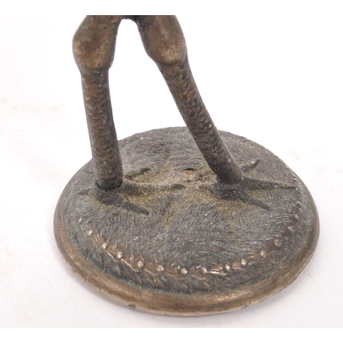 372 - A small vintage table bell of metal construction moulded into the shape of a long legged Heron bird ... 