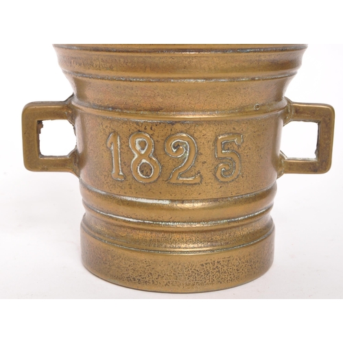 373 - A 19th Century George IV brass pestle & mortar set. The mortar in the form of a bucket with x2 s... 