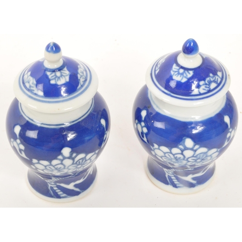 374 - Two small 20th Century Chinese blue and white ceramic ginger jars with prunus blossom decoration and... 